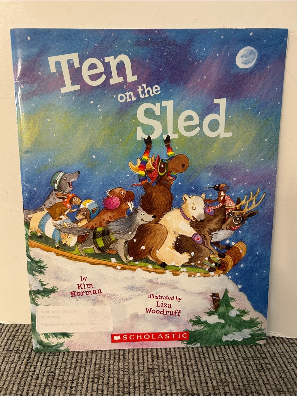 Ten on a Sled scholastic paperback book by Kim Norman